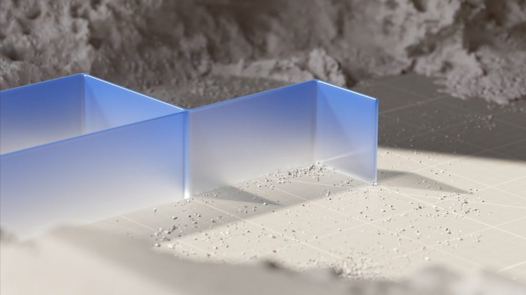 a couple of blue boxes sitting on top of a table